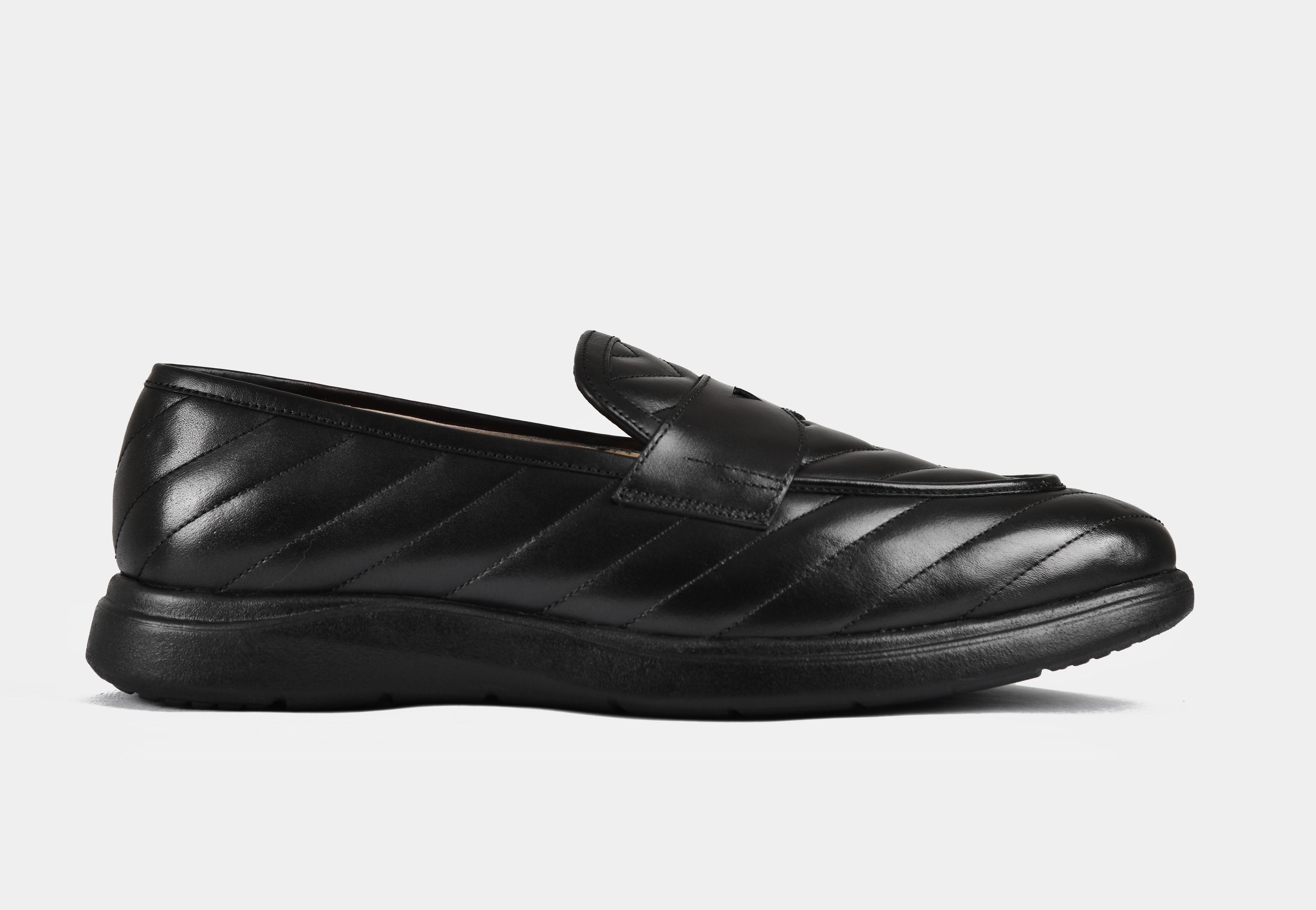 Black Quilt Slip-ons | Aero-Flex